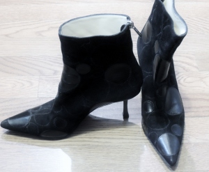 A great pair of Jimmy Choo Boots will add an urban feel to your pearls...